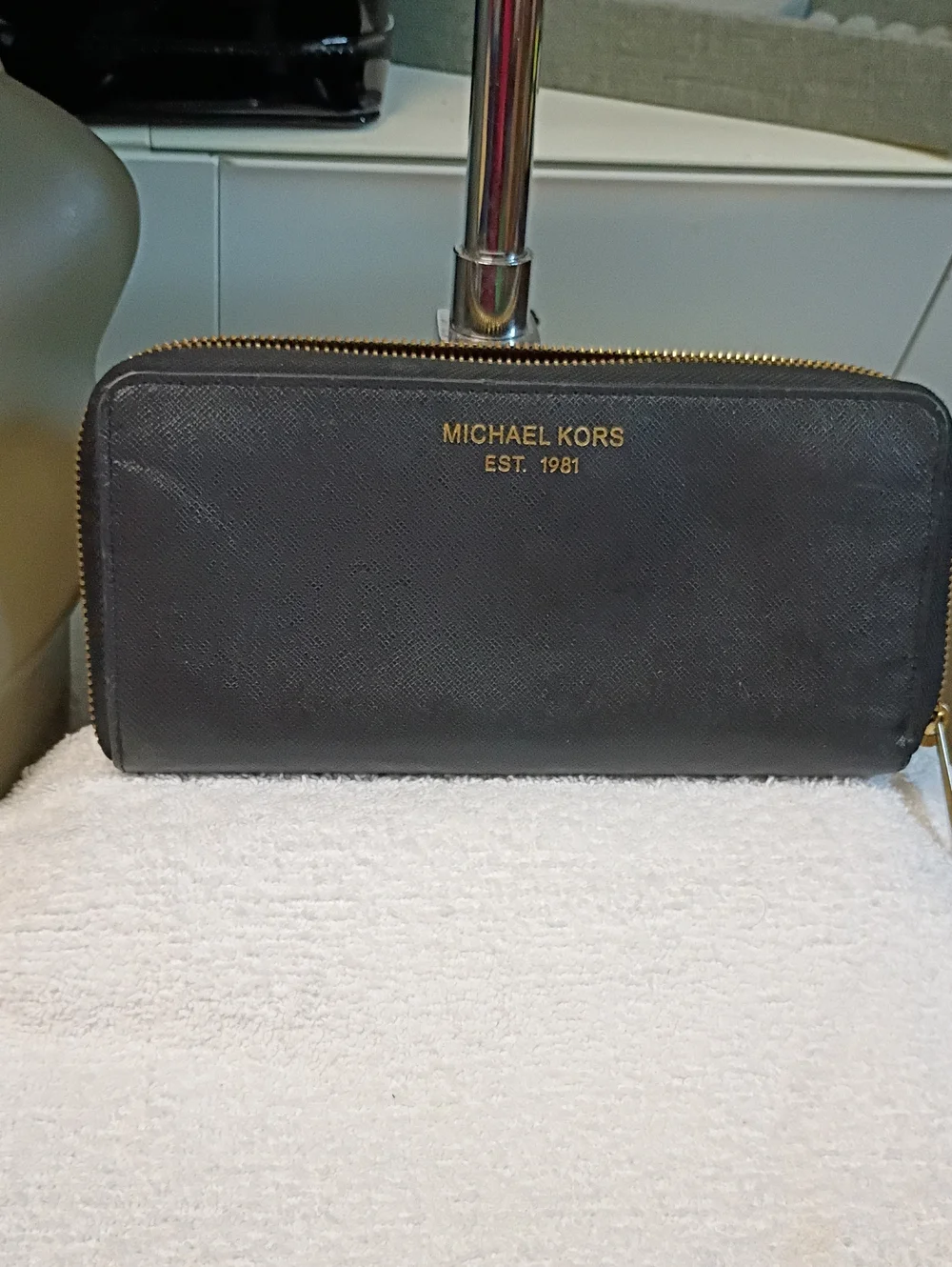 Michael Kors Black Zip-Around Saffiano Wallet with Gold Logo